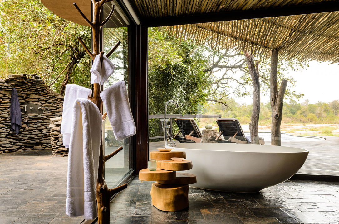 open bathroom view at suite of singita boulders lodge