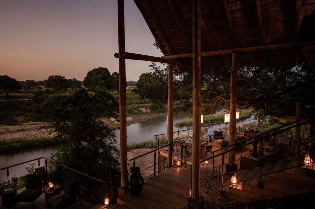 viewing deck of singita ebony lodge at sunset