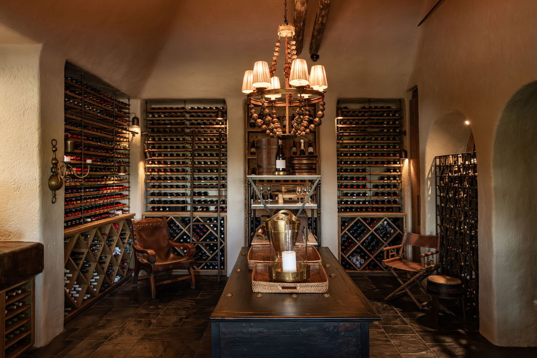 Singita Ebony Lodge Wine Cellar with shelves full of wine