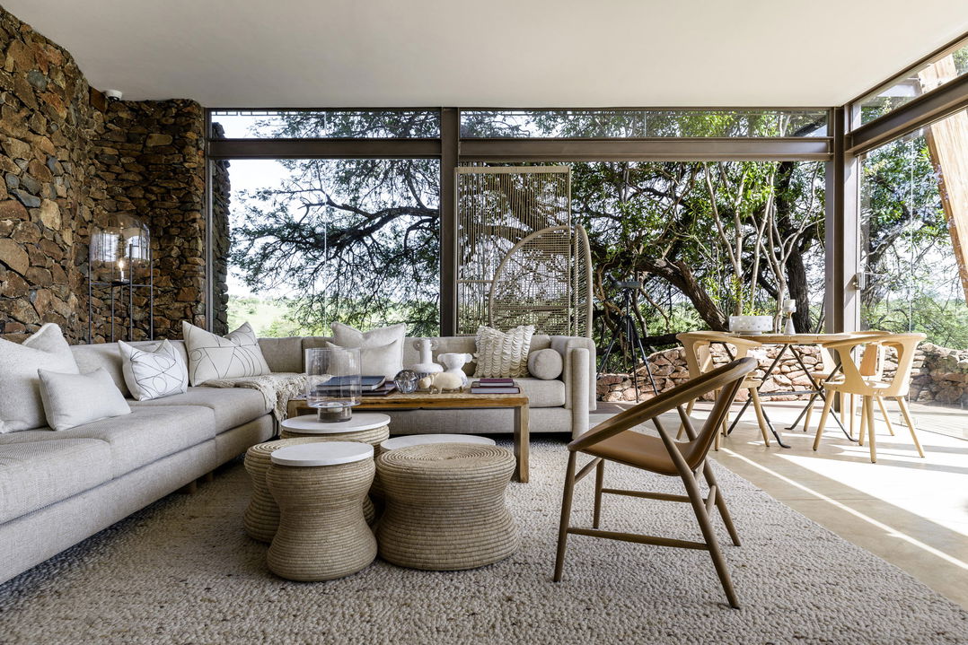 seating area with a view in a luxury suite of Singita Faru Faru lodge Serengeti