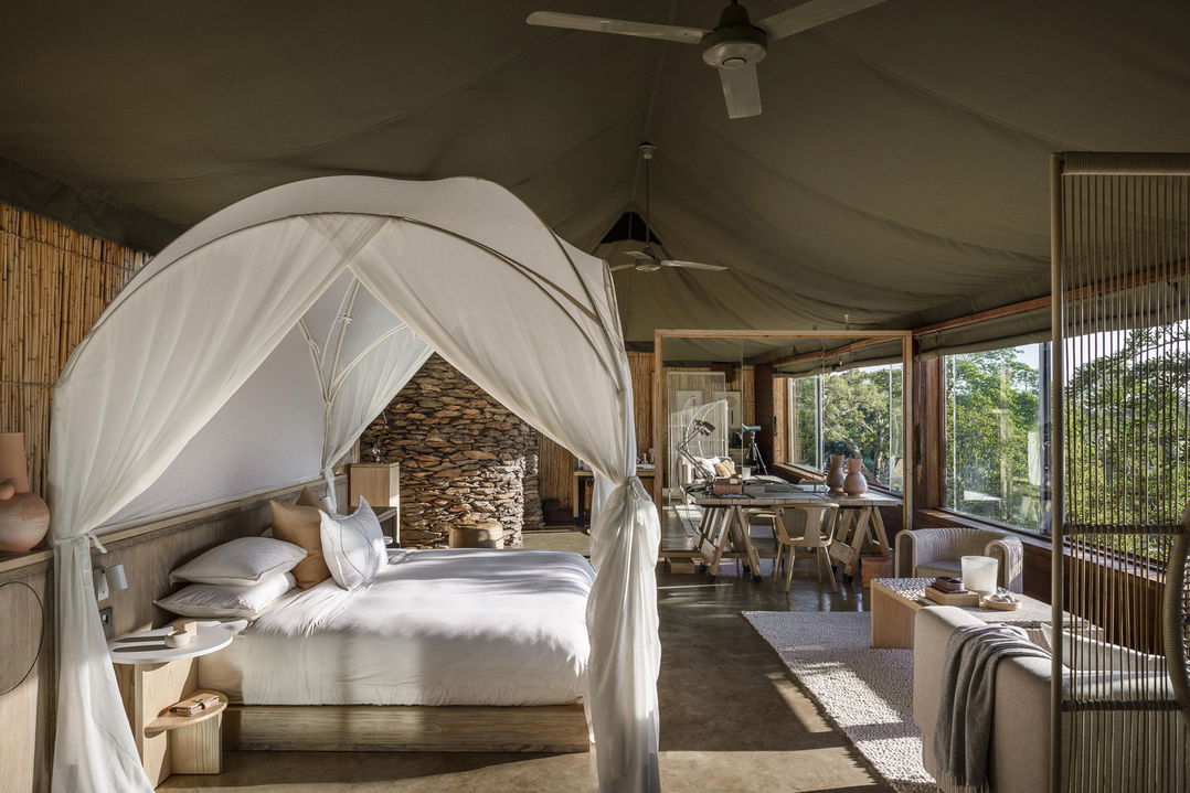 inside a bedroom of a luxury suite of Singita Faru Faru lodge Serengeti