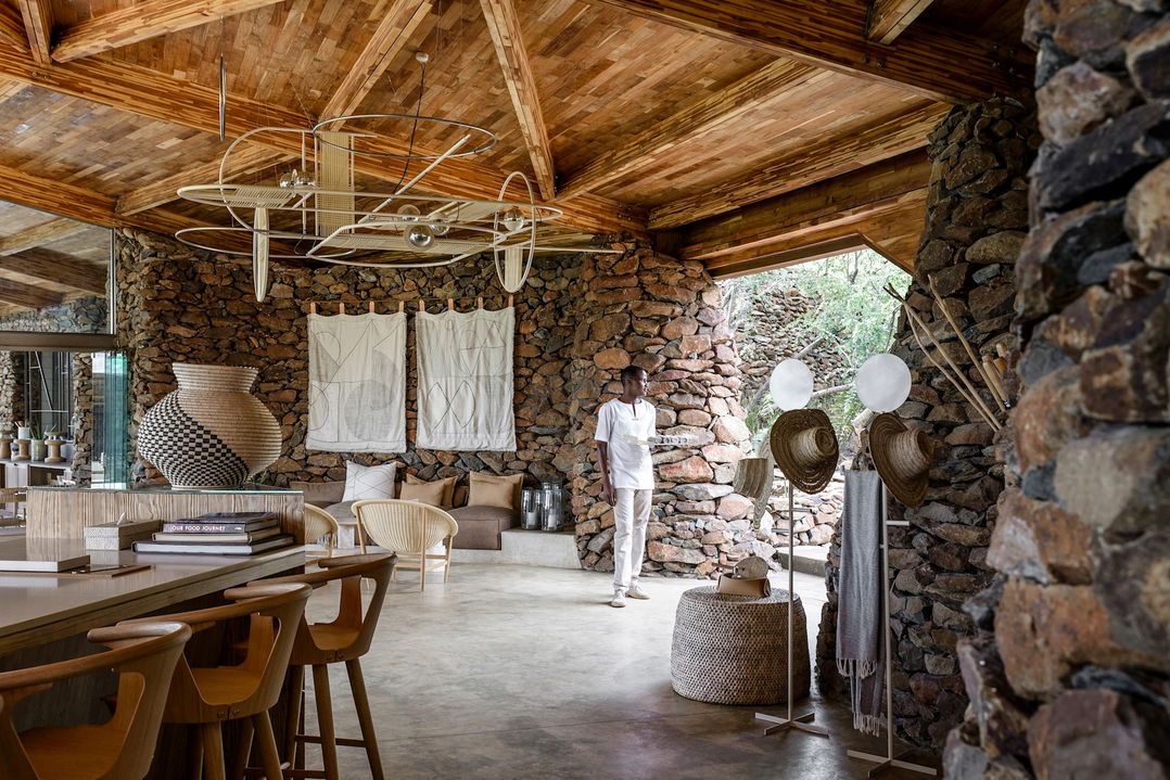 welcoming drinks in the arrival foyer of Singita Faru Faru lodge Serengeti