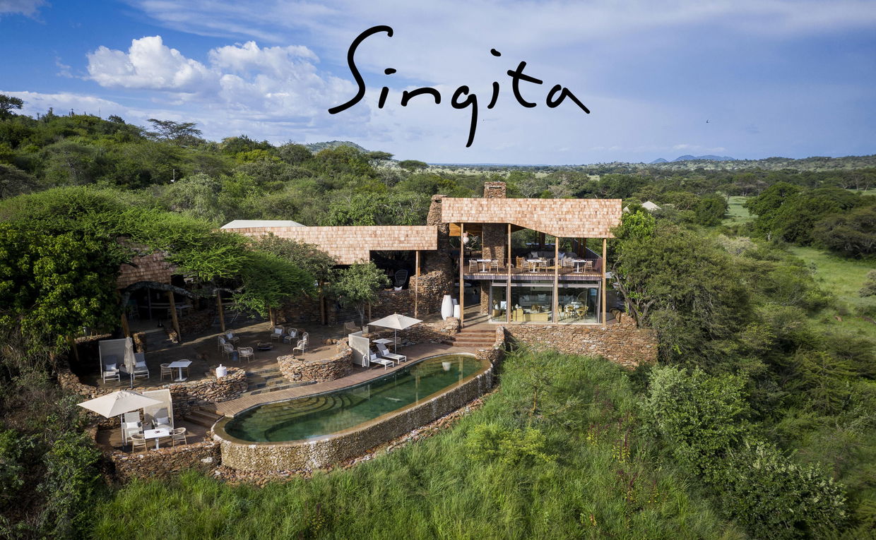 aerial view of exterior of Singita Faru Faru lodge Serengeti with logo overlay