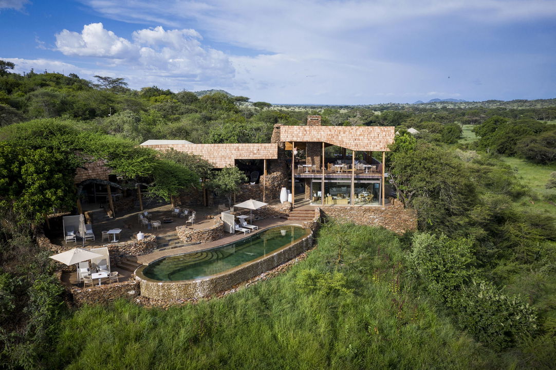 aerial view of the exterior of Singita Faru Faru lodge Serengeti