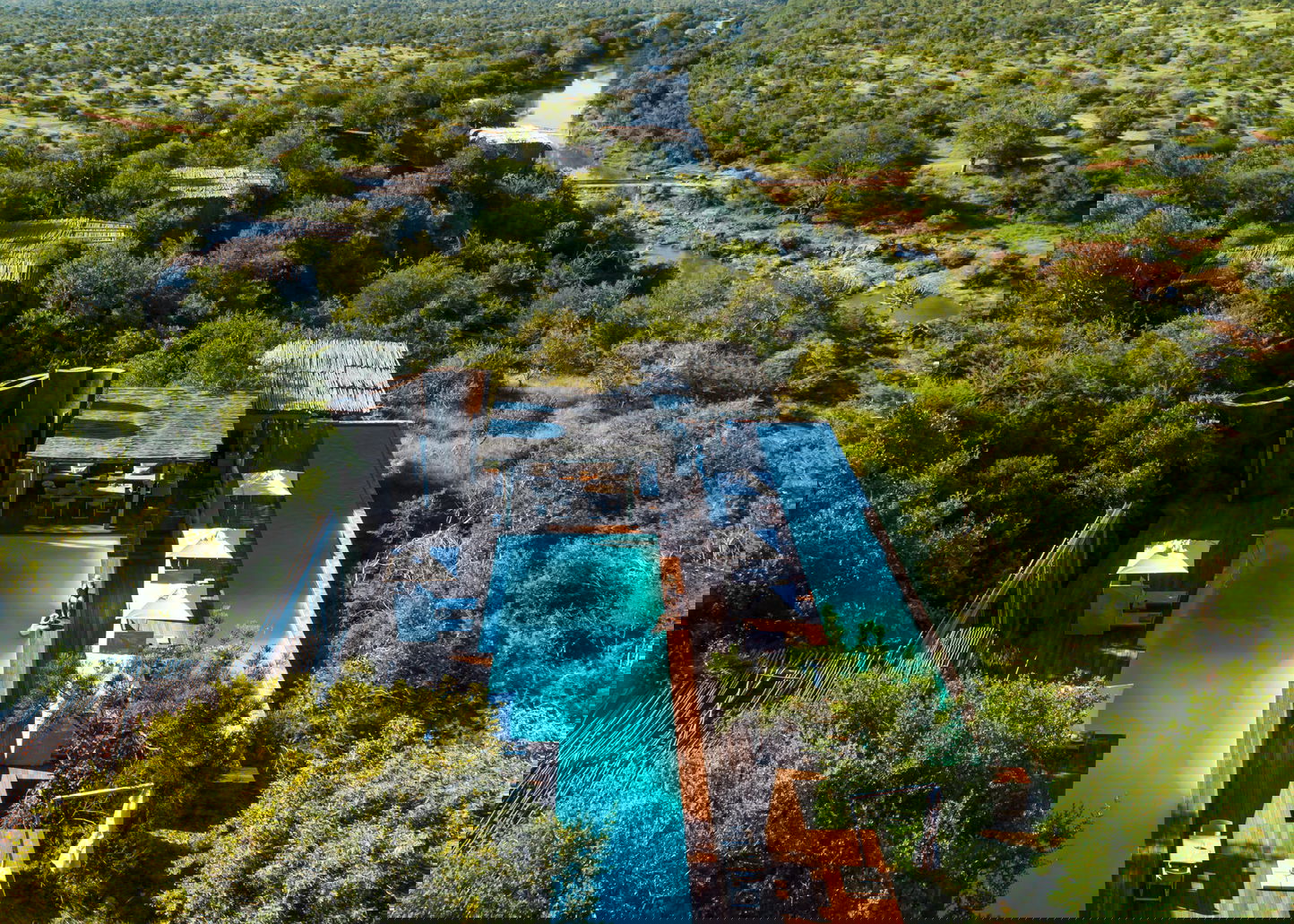 aerial shot of singita lebombo lodge showing pool of main lodge