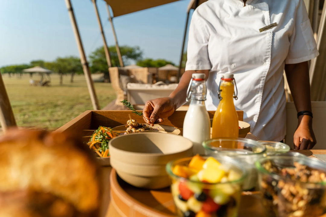 breakfast serving on a tray by Singita Sabora Tented Camp Serengeti 