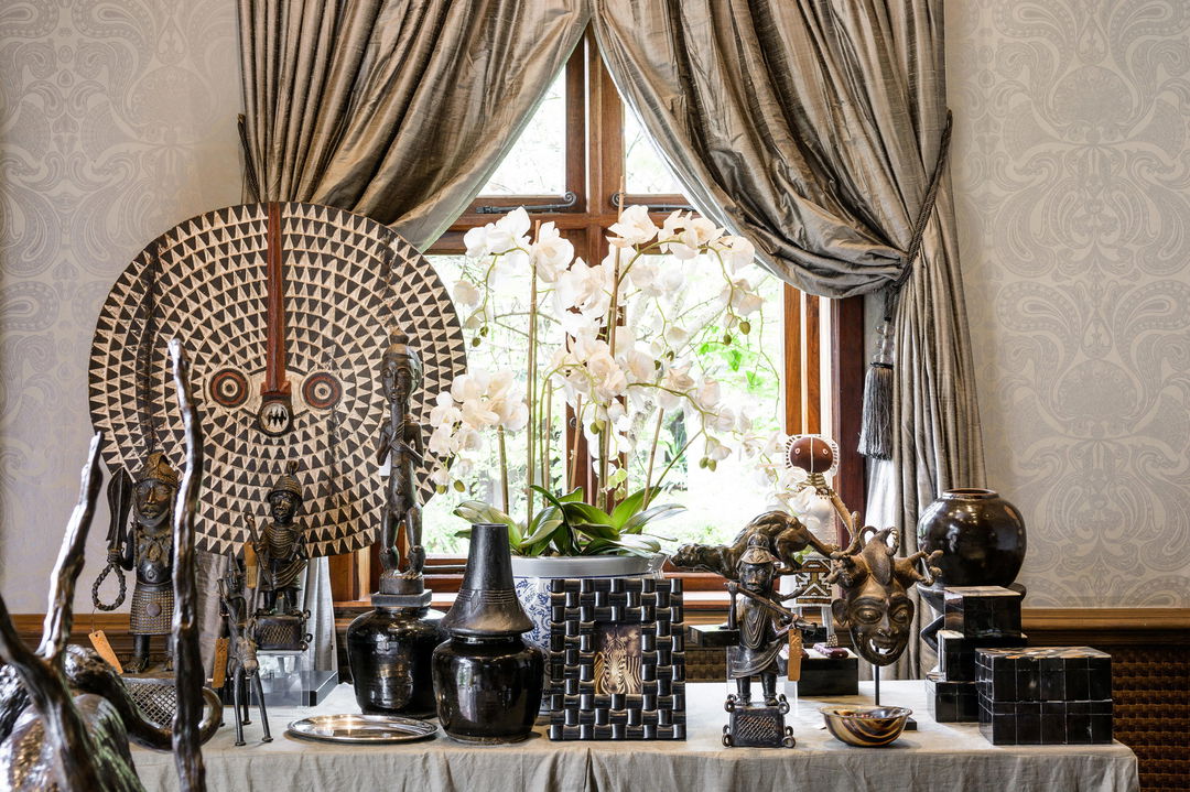 more african art objects on display at the boutique of Singita Sasakwa lodge in Serengeti