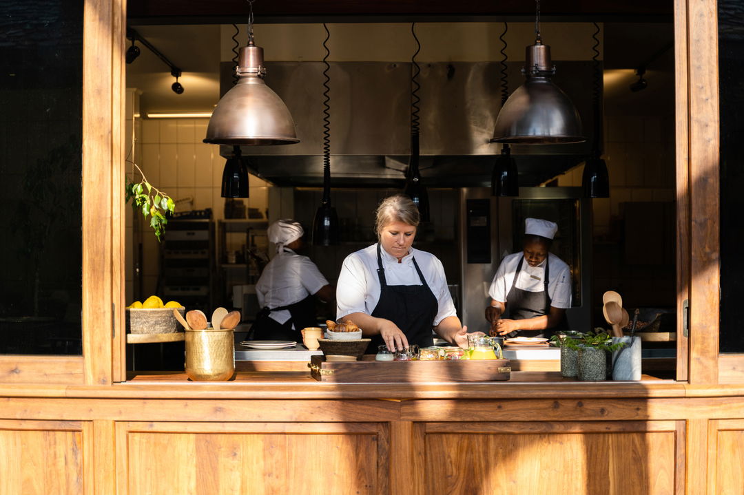 chef in the interactive kitchen of Singita Sasakwa lodge in Serengeti