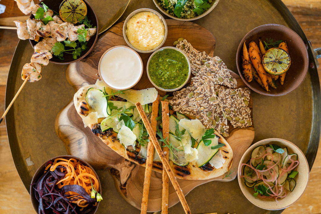 gourmet food plated on a table at Singita Sasakwa lodge in Serengeti