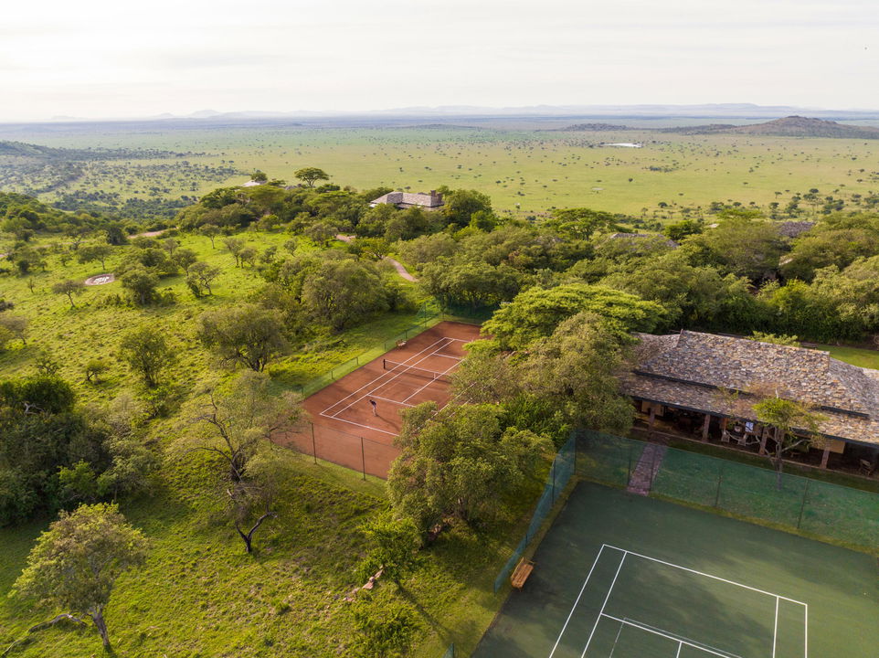 aerial view of the tennis courts at Singita Sasakwa lodge in Serengeti