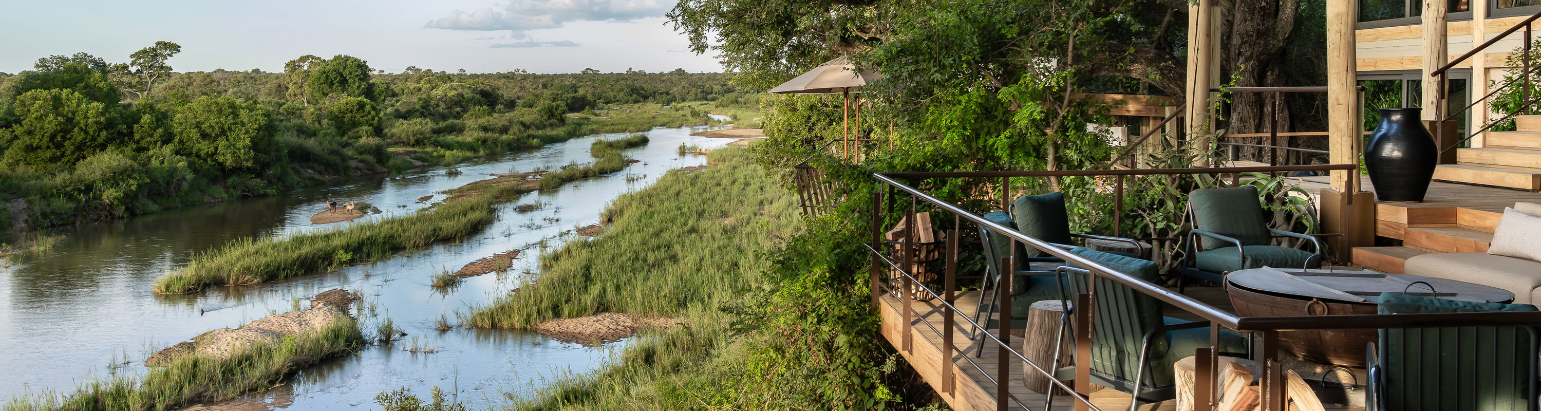 singita ebony lodge fire deck with river in background below