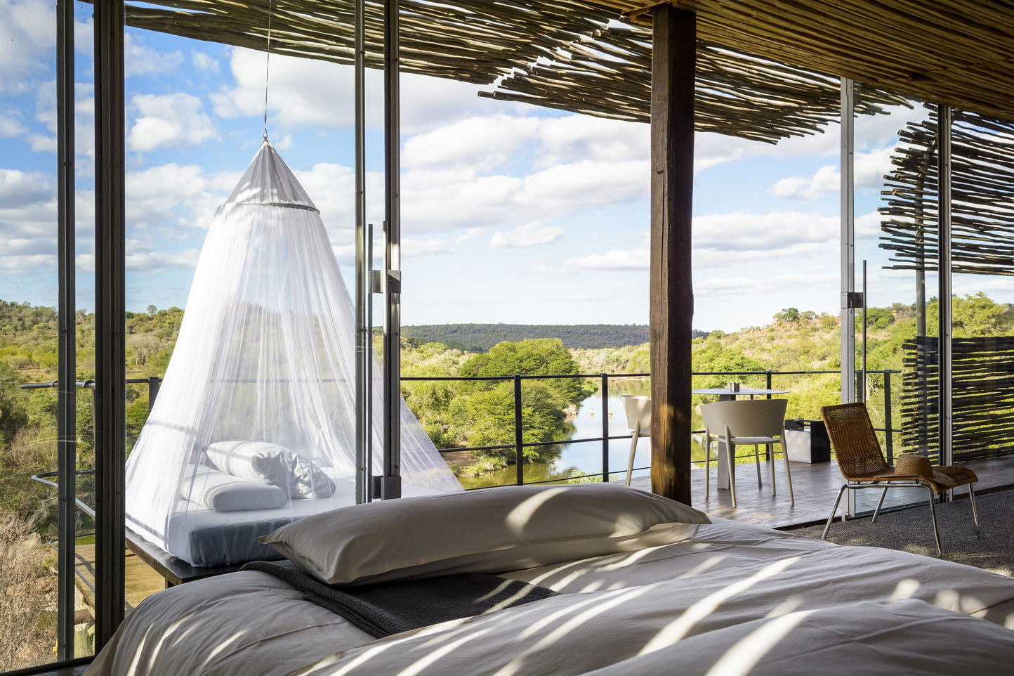 Singita Lebombo lodge suite with balcony and views of bush