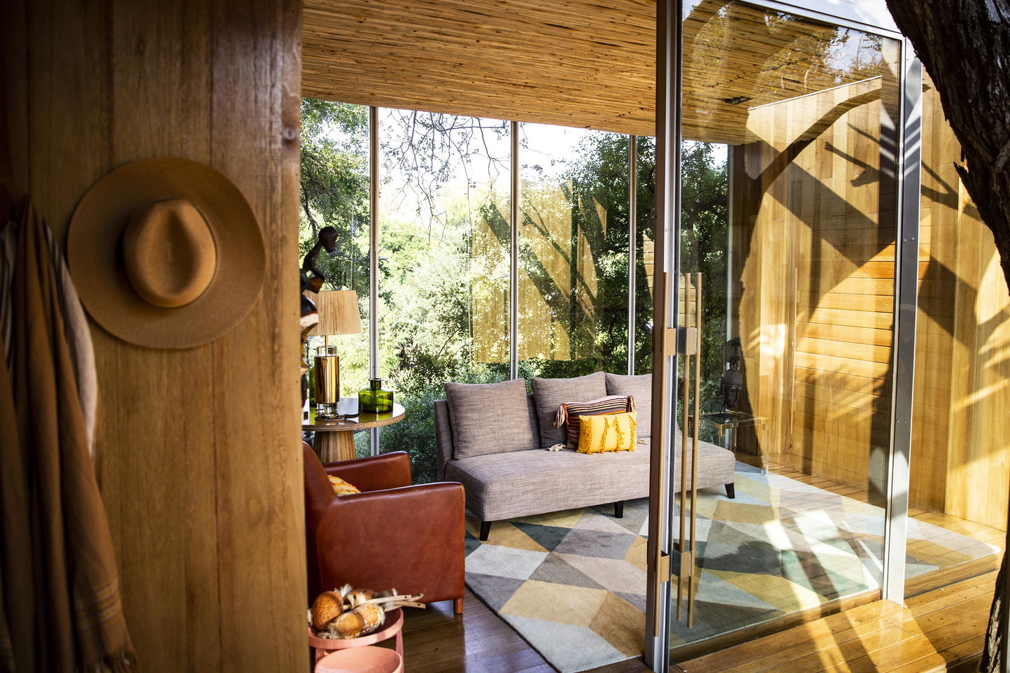 interior of suite with luxury furniture at Singita Sweni lodge
