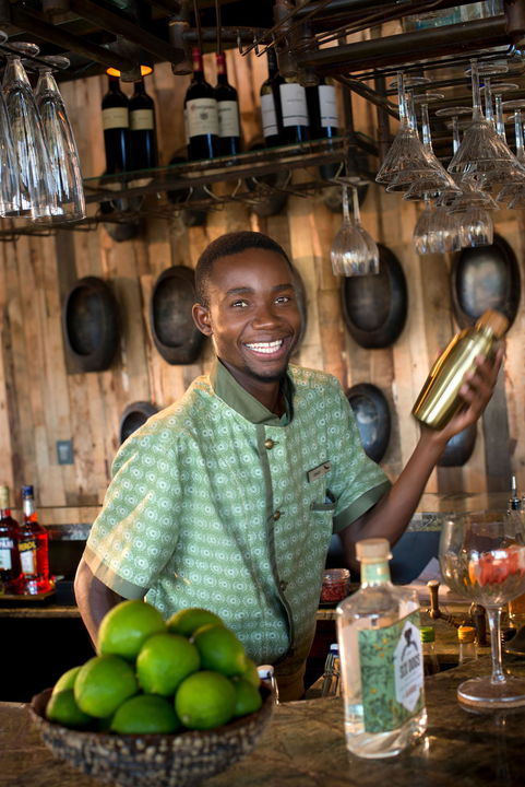 friendly staff mixing drinks at &Beyond Tengile River Lodge Sabi Sands