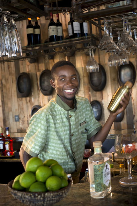 friendly staff mixing drinks at &Beyond Tengile River Lodge Sabi Sands