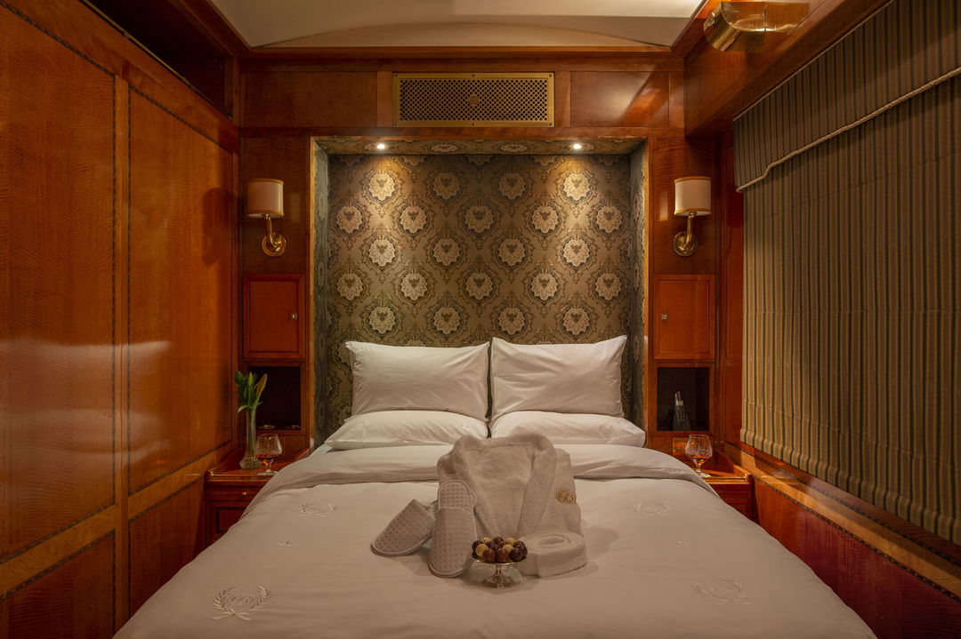 double bed made up in luxury room on Blue Train South Africa