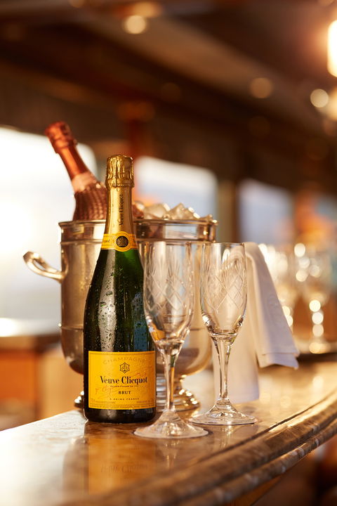 French champagne with two flutes and ice bucket ready for serving on Blue Train South Africa