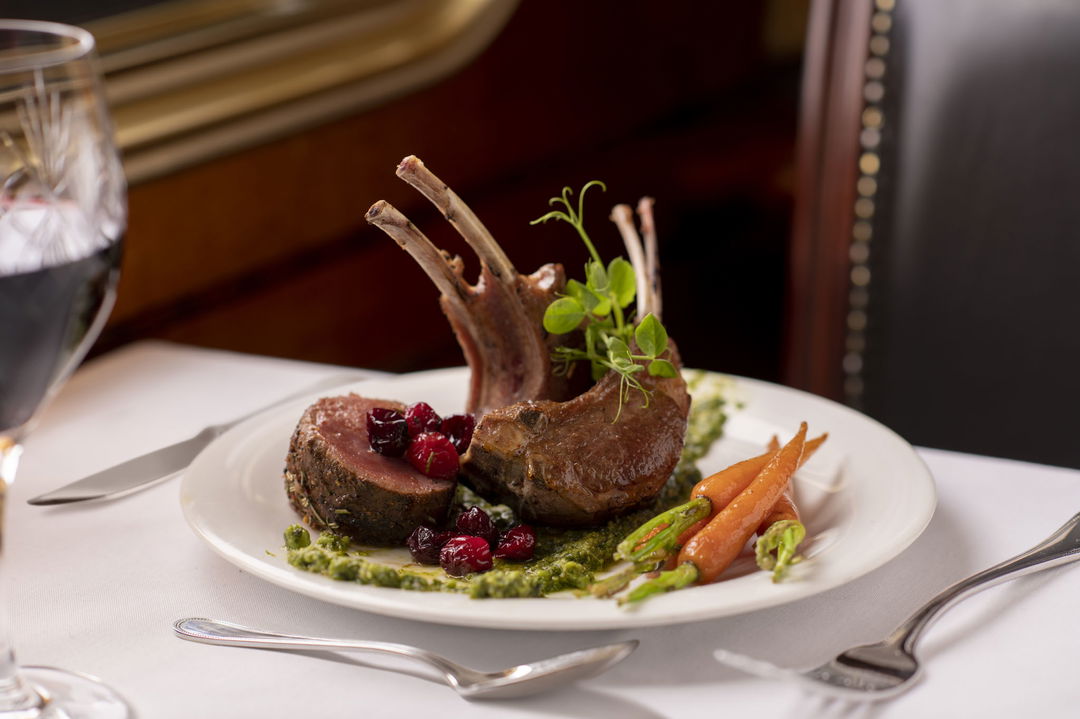 rack of lamb and baby carrots dish served on Blue Train South Africa