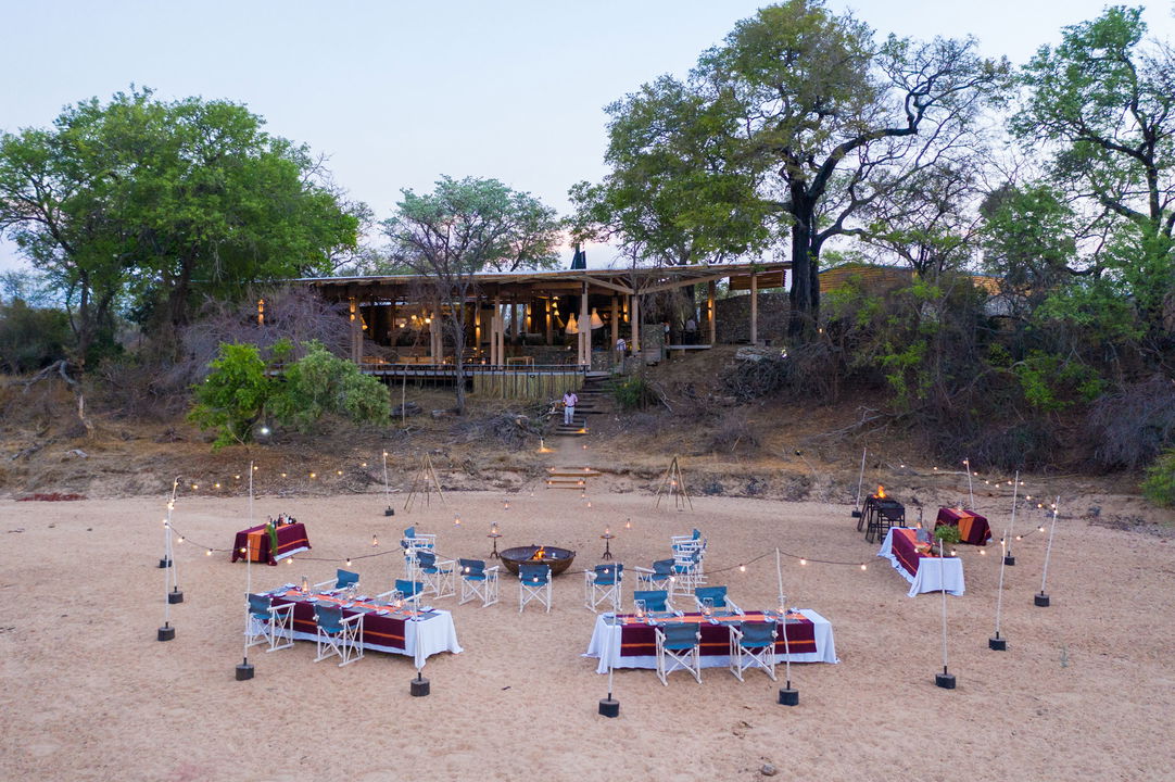 table set in reverbed for occasion by thornybush saseka tented camp