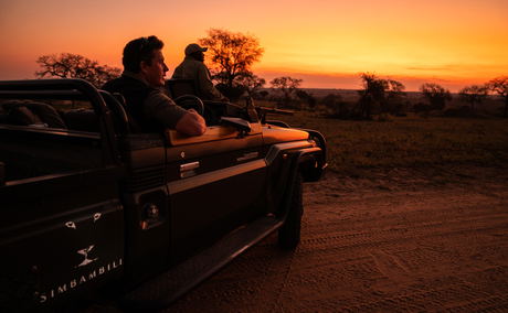 guest in safari vehicle going on night drive at Thornybush game lodges