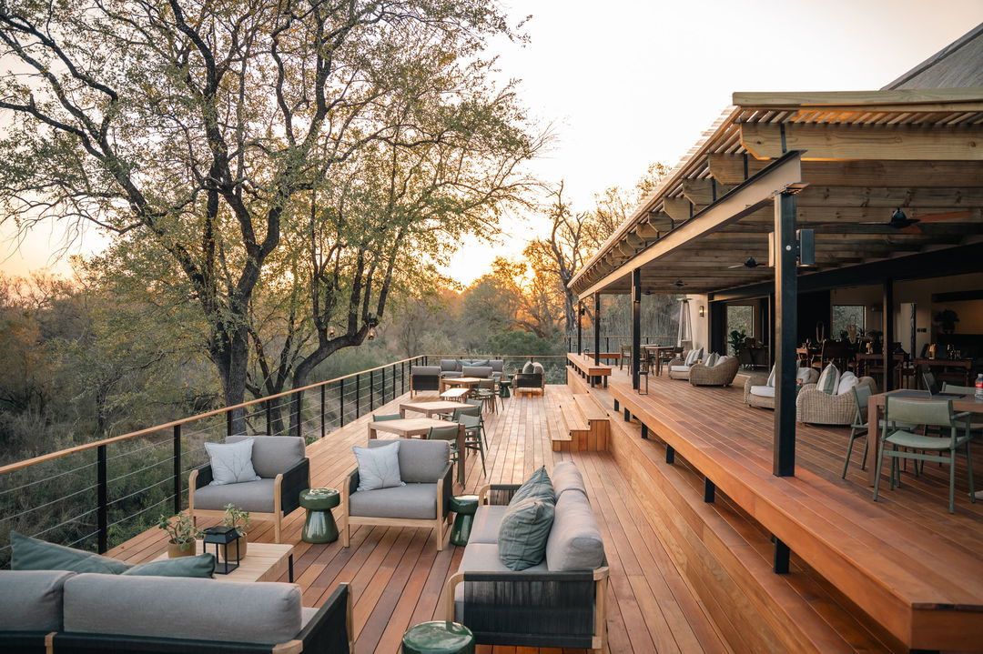 view of deck and seating at simbambili lodge thornybush