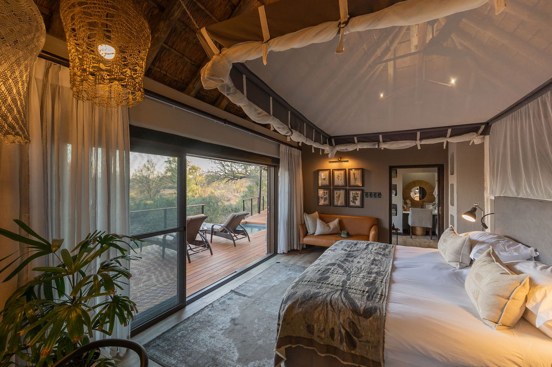 partial view of room and deck of thornybush simbambili lodge