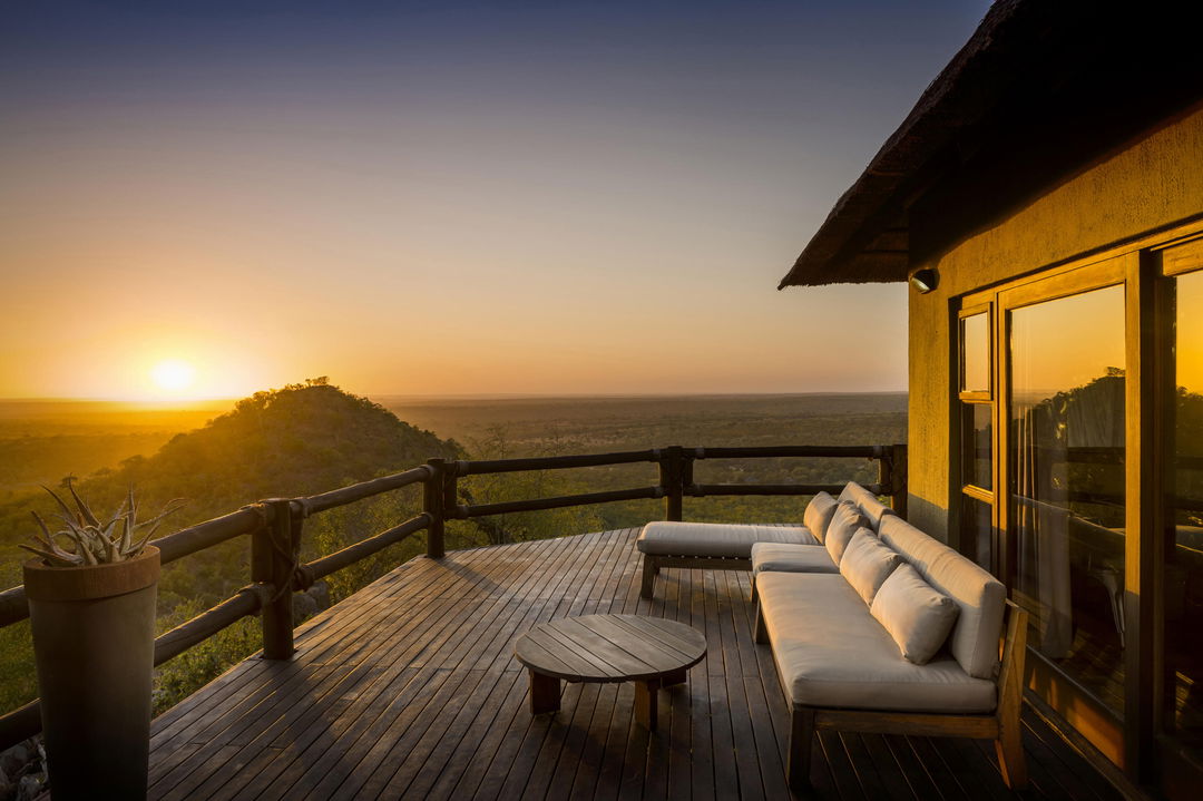 sunset view from the deck of ulusaba rock lodge