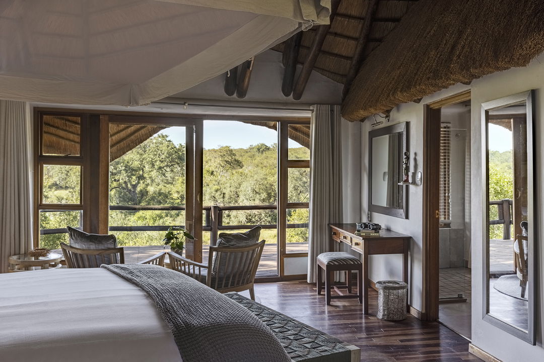 interior of elephant room and deck at safari lodge Ulusaba