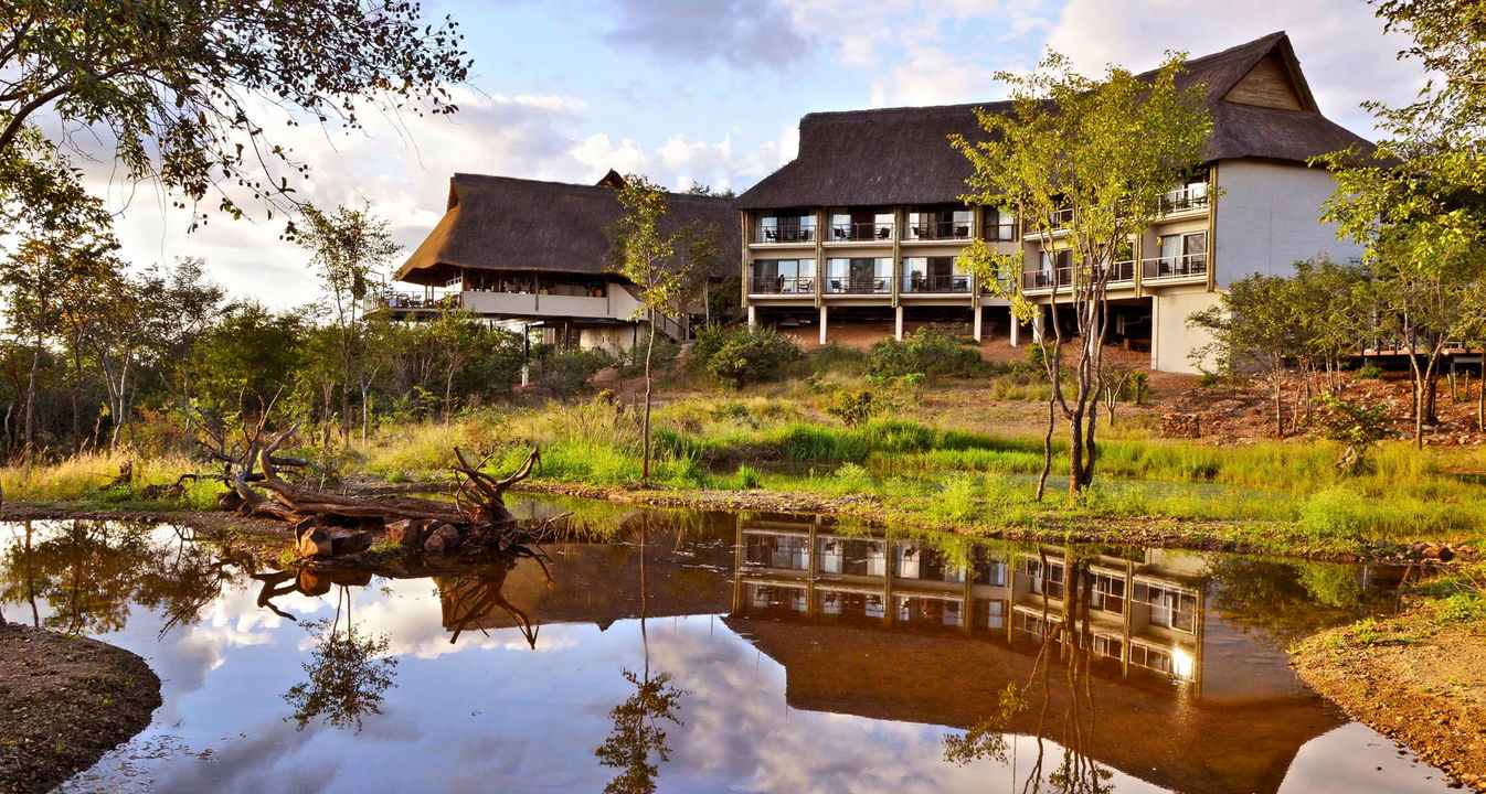 side view of Victoria falls safari lodge Zimbabwe from small water hole