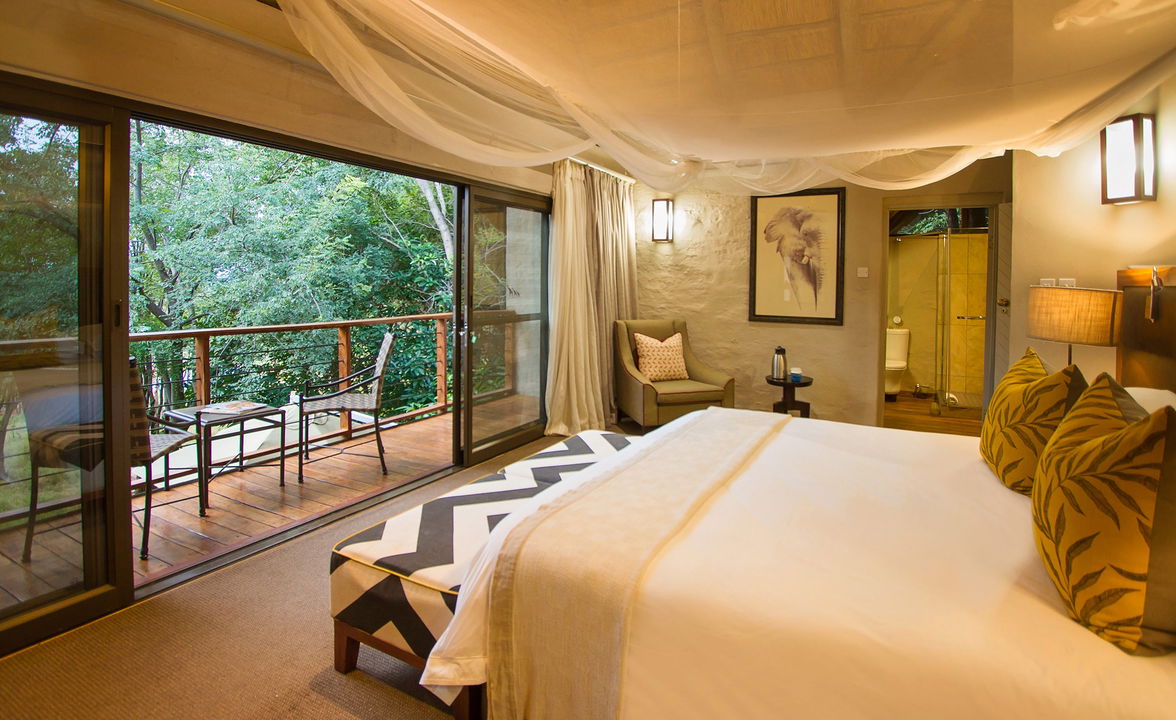 view of the bedroom at Victoria falls safari suites