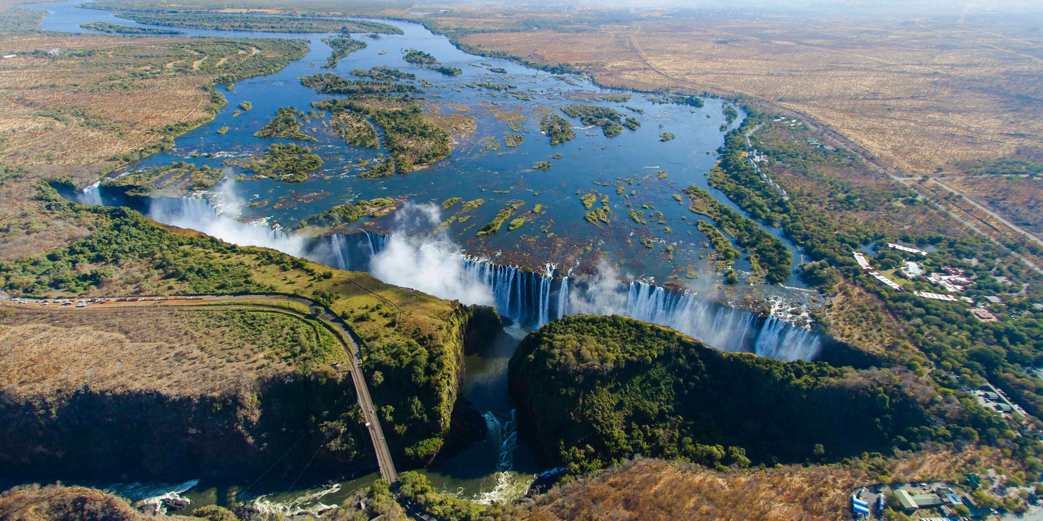 ariel view of entire width of Victoria falls Zimbabwe in full flow