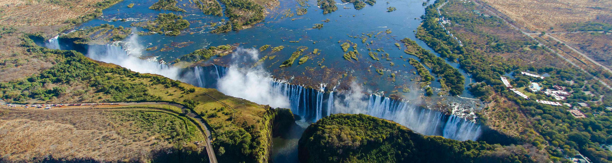 ariel view of entire width of Victoria falls Zimbabwe in full flow