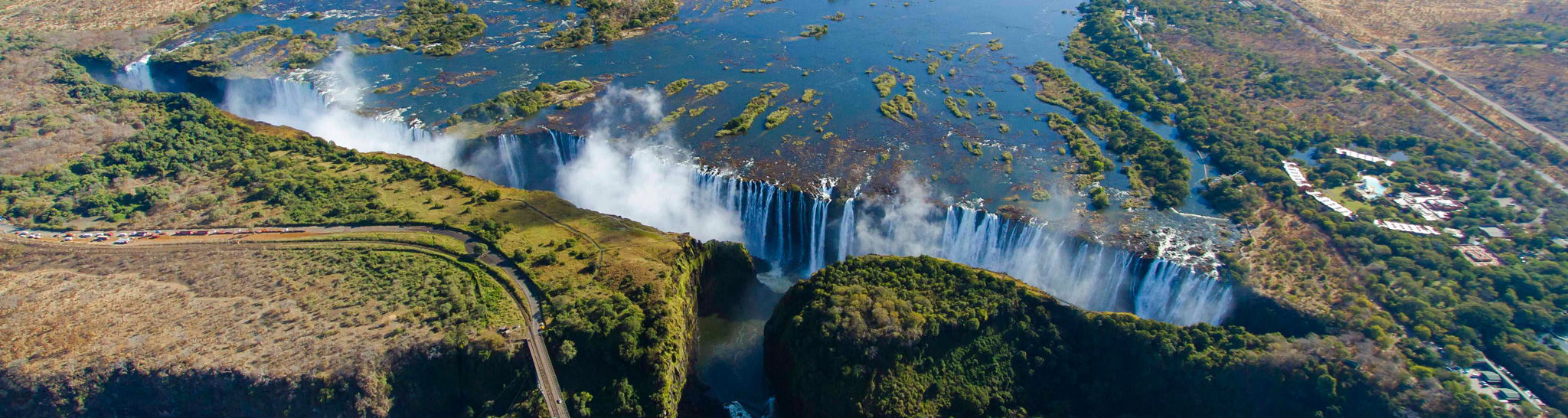 ariel view of entire width of Victoria falls Zimbabwe in full flow