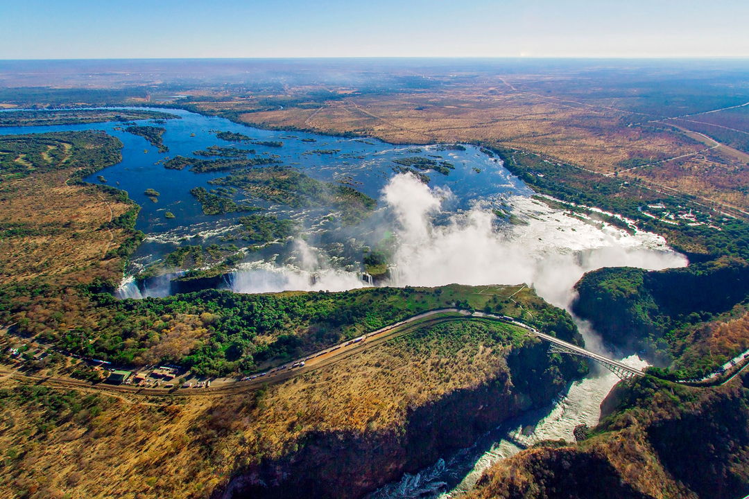 ariel view of entire width of Victoria falls Zimbabwe in full flow