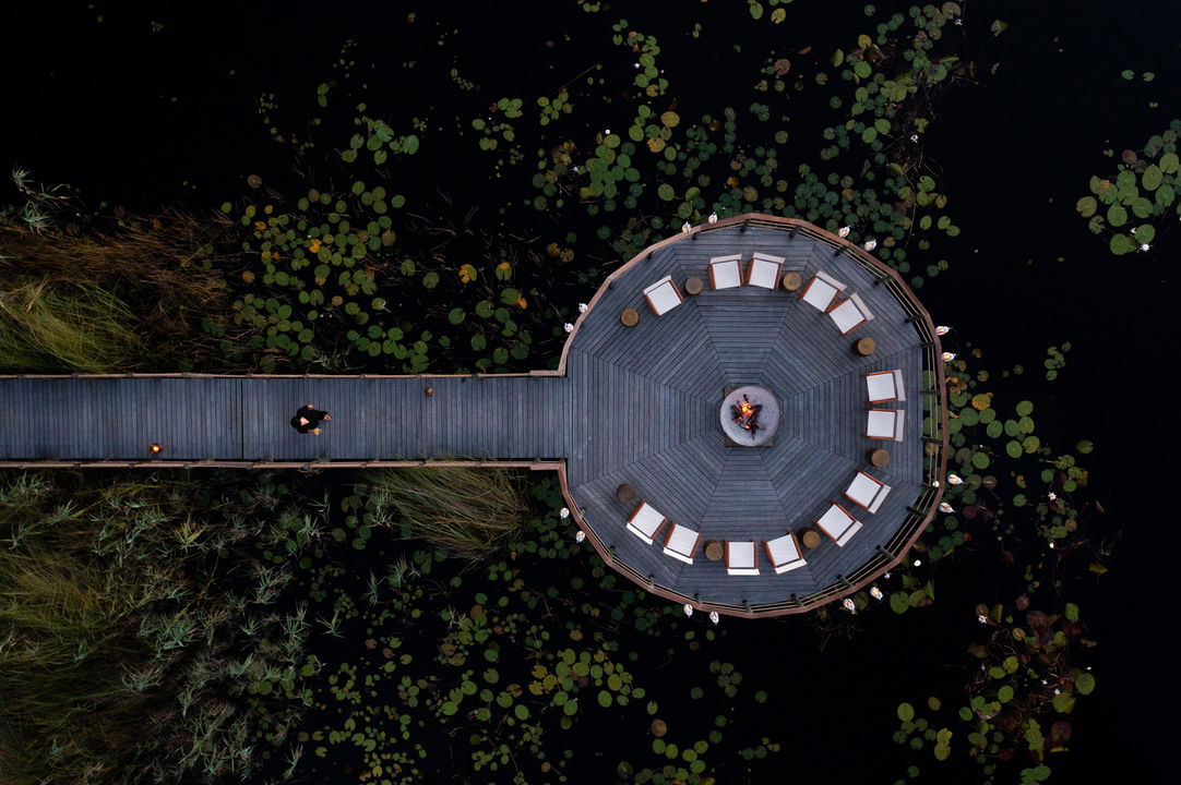 aerial view of viewing deck of wilderness duma tau camp botswana