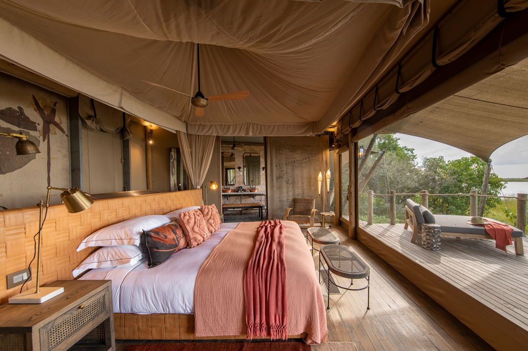 side view with private deck of a suite at wilderness duma tau camp botswana