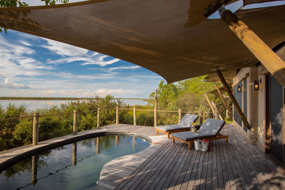 splash pool and deck by private suite of wilderness duma tau camp botswana