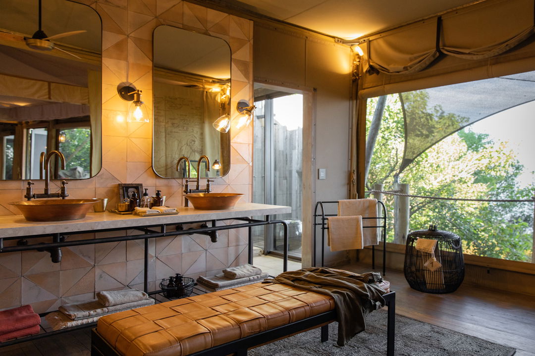 bathroom view of a suite at wilderness duma tau camp botswana