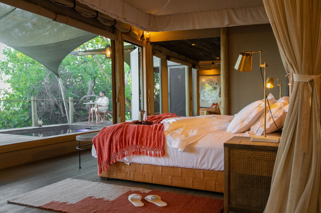 interior view of bedroom at wilderness duma tau camp botswana