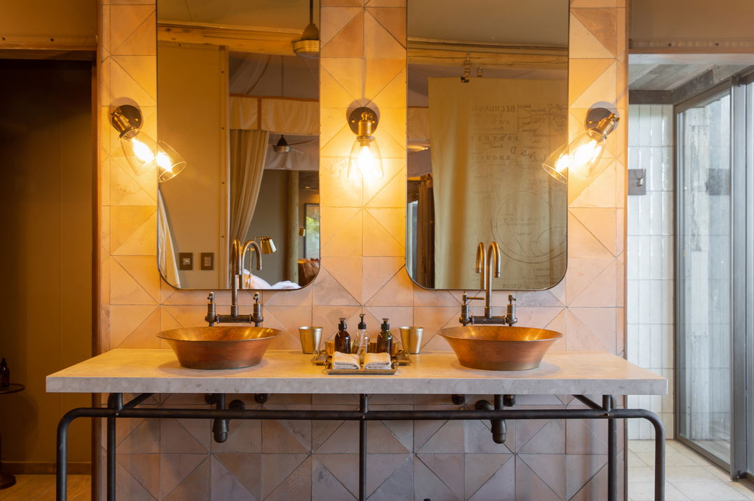 bathroom facilities of a suite at at wilderness duma tau camp botswana