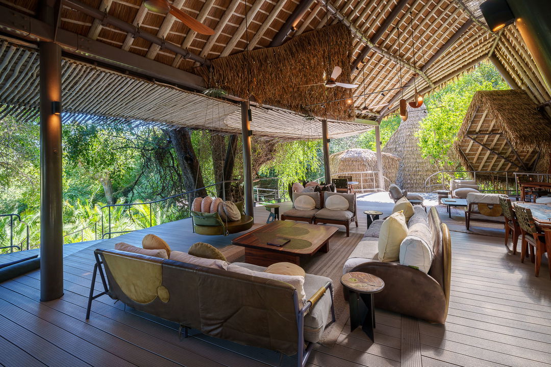 lounge area with couches in the main lodge of Jao Camp Wilderness Botswana