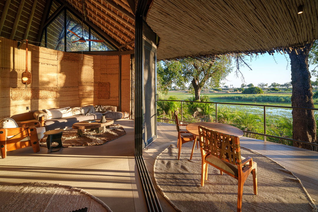 side view of room with open deck veranda on delta at Jao Camp Wilderness Botswana