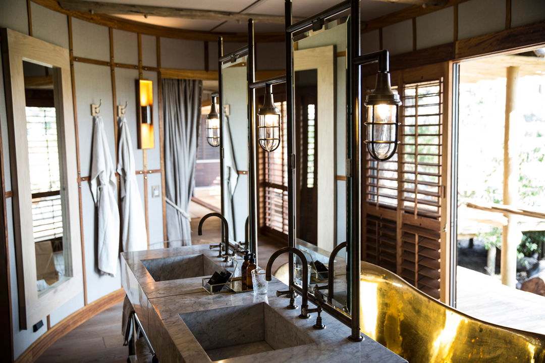 bathrooms interior view of luxury suite at Okavango Delta by Little Mombo Wilderness