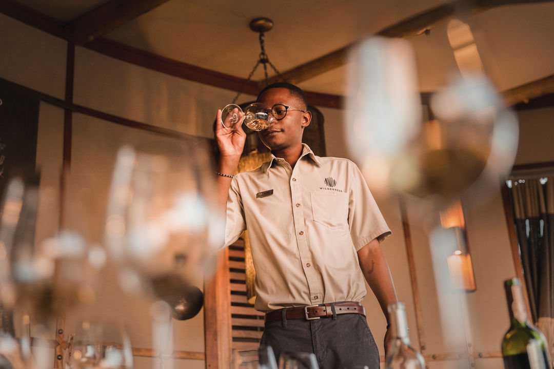 wine tasting with sommelier at Wilderness Mombo Camp Okavango Delta