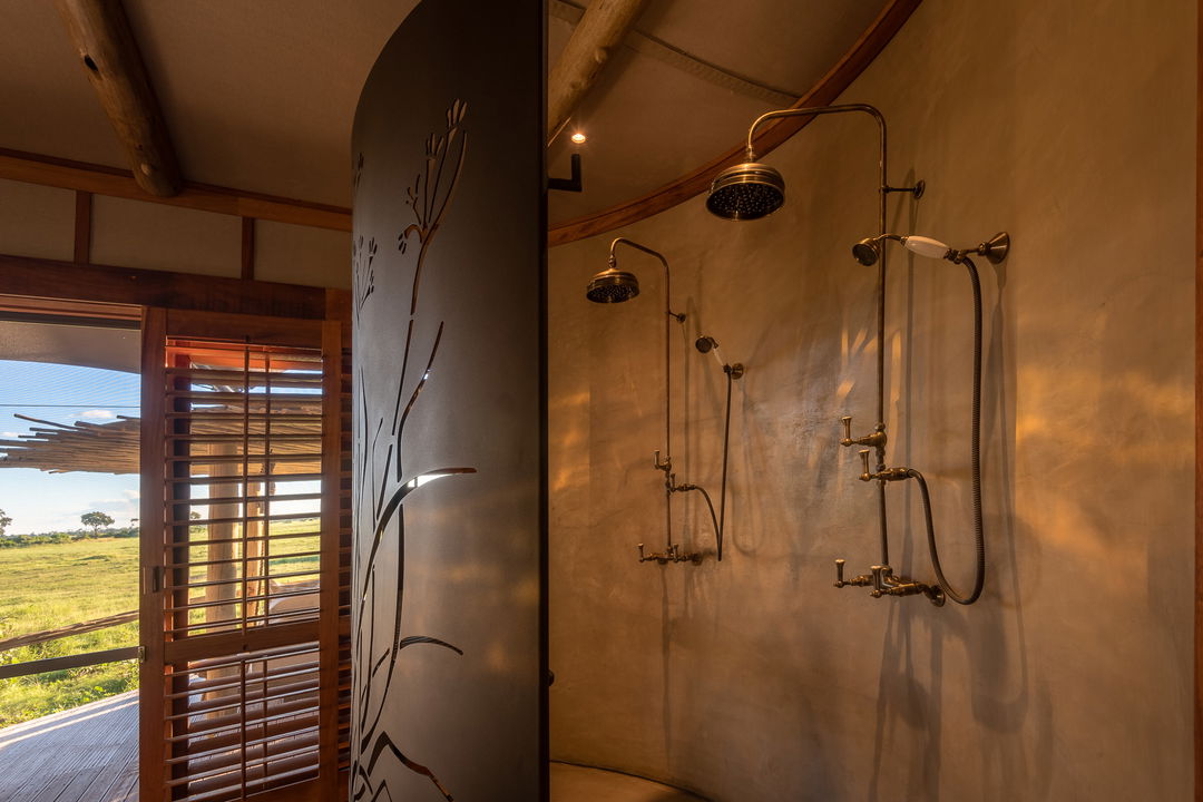 the bathroom showers at Wilderness Mombo Camp Okavango Delta
