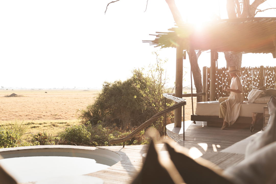patio with pool at a room at Wilderness Mombo Camp in the Okavango Delta