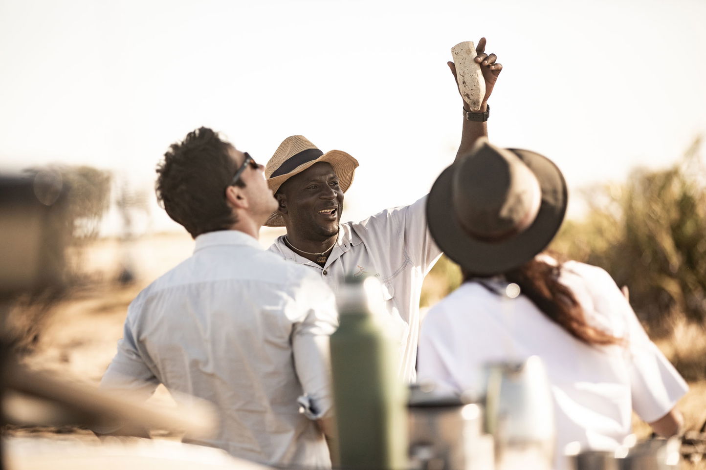 guide educating guests on walking safari at Jao Camp Wilderness Okavango Delta Botswana