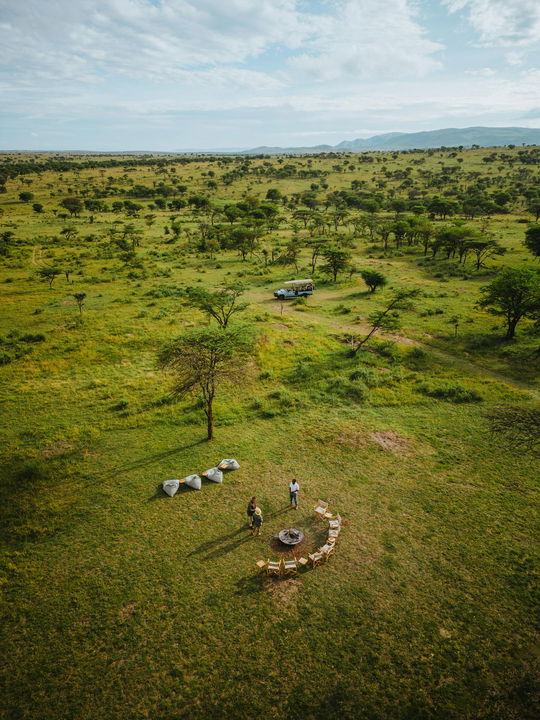 aerial view of bush lunch setting prepared for guests at Wilderness Usawa tented camp Serengeti
