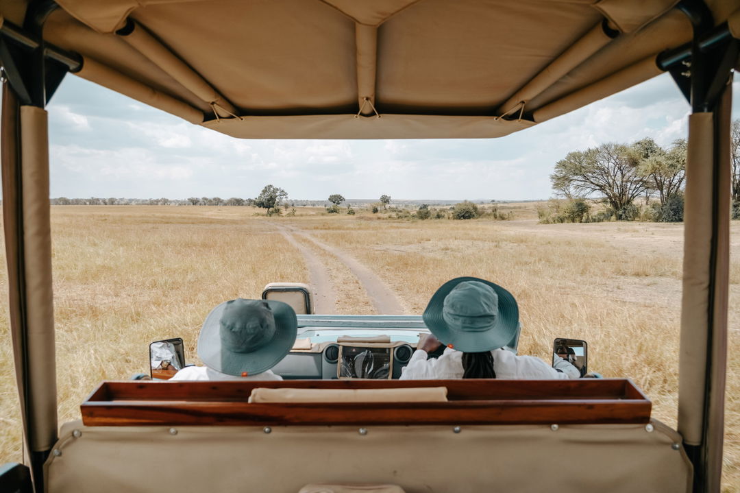 guests on a game drive by Wilderness Usawa tented camp Serengeti
