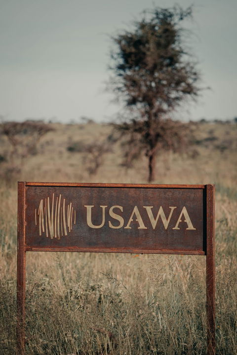 signpost of the camp by Wilderness Usawa tented camp Serengeti